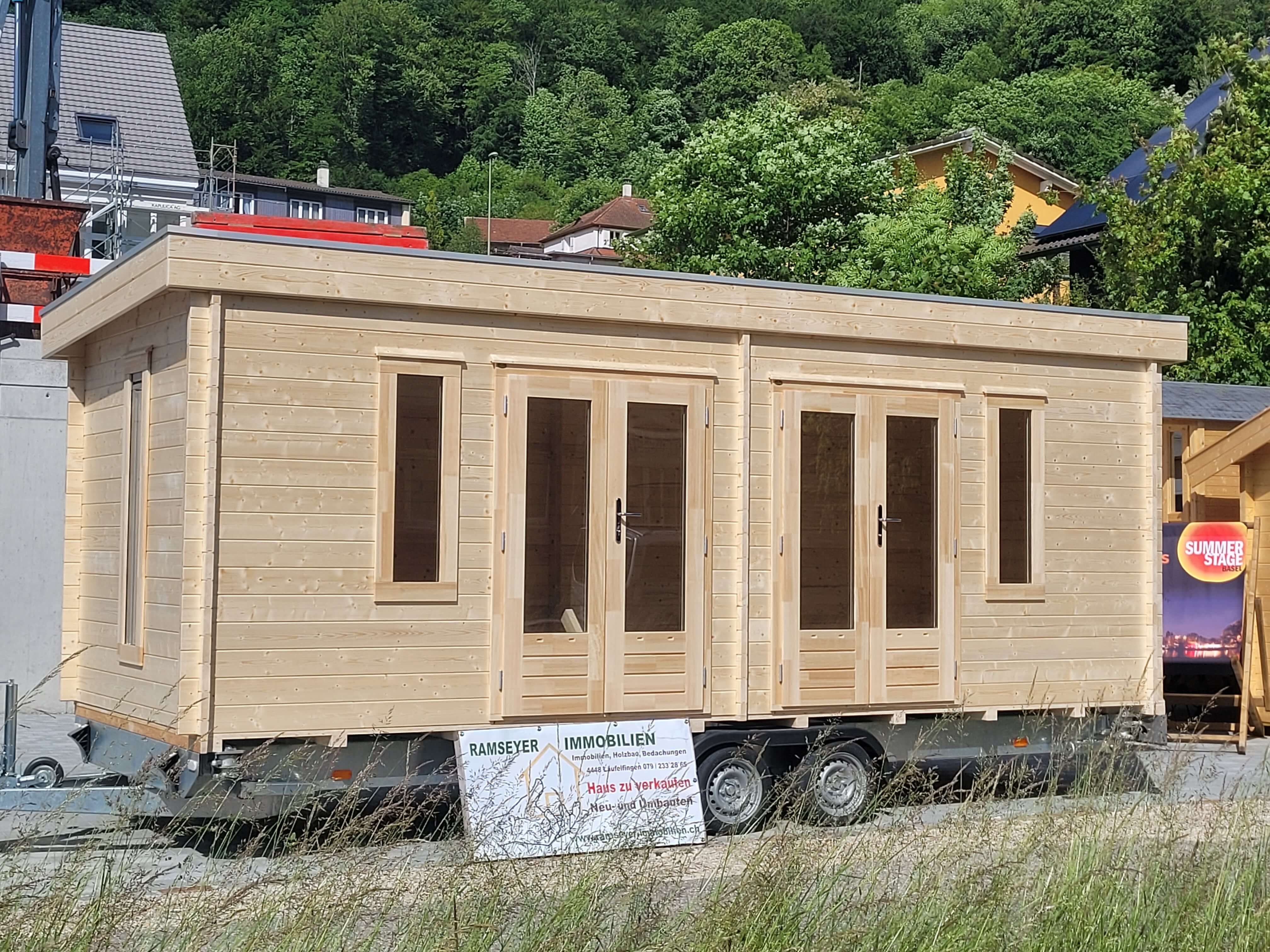Tiny - Haus mit Auto-Anhänger